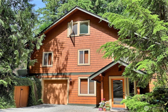 22307 E Lost Lake Rd, Snohomish, WA 98296 - view of front of home with a garage and gravel driveway