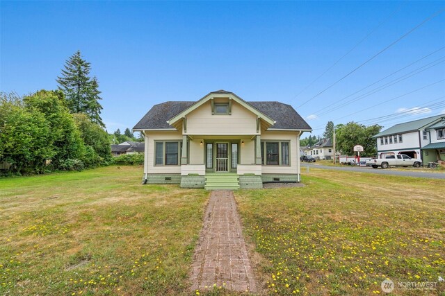 802 May St, Raymond, WA 98577 - bungalow with crawl space, a front lawn, covered porch, and a shingled roof