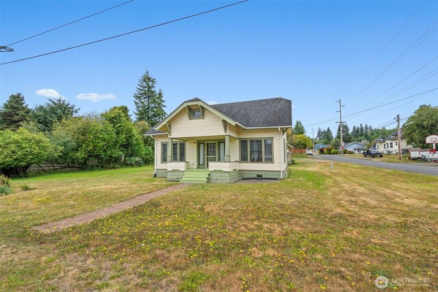 802 May St, Raymond, WA 98577 - bungalow-style house featuring a front yard, a porch, crawl space, and a shingled roof