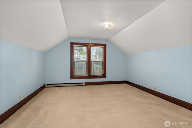 802 May St, Raymond, WA 98577 - bonus room with a baseboard heating unit, carpet, and vaulted ceiling