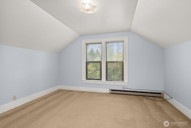 802 May St, Raymond, WA 98577 - bonus room featuring a baseboard heating unit, carpet floors, and vaulted ceiling