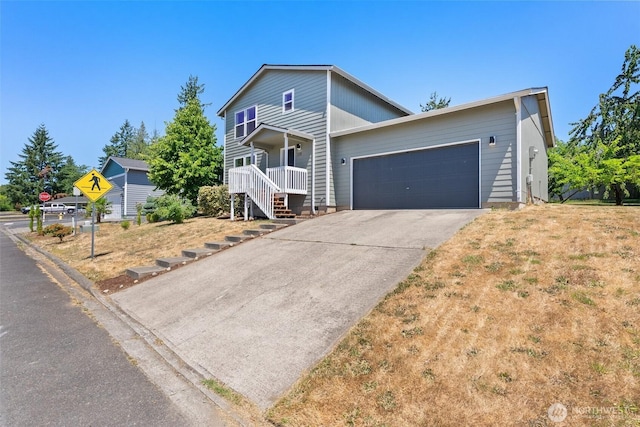110 Cedar Crest Pl, Napavine, WA 98532 - view of front of house with an attached garage, driveway, stairs, and a porch
