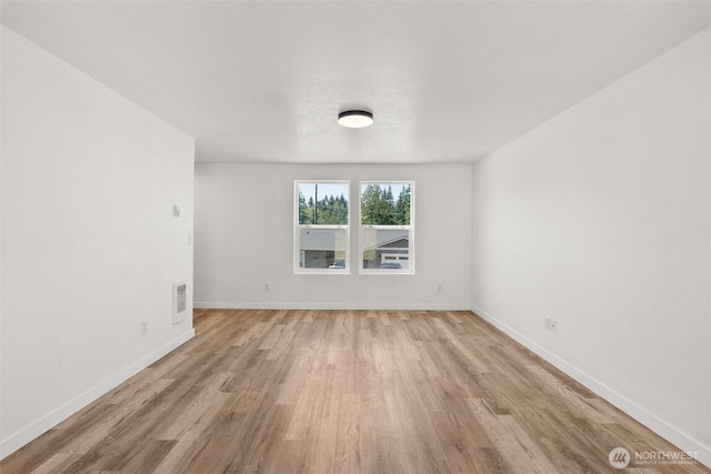 110 Cedar Crest Pl, Napavine, WA 98532 - spare room featuring light wood-type flooring and baseboards