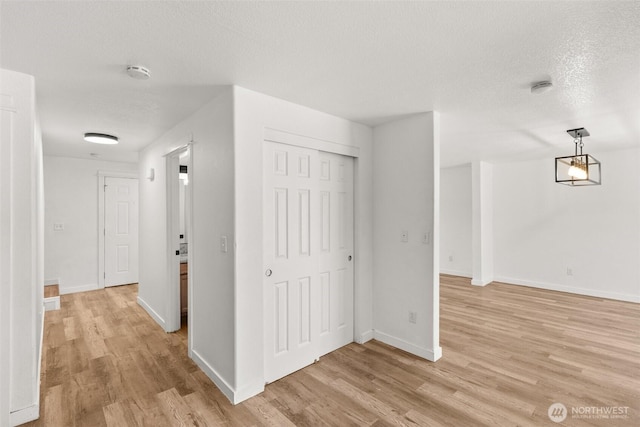 110 Cedar Crest Pl, Napavine, WA 98532 - corridor with light wood-style flooring and a textured ceiling