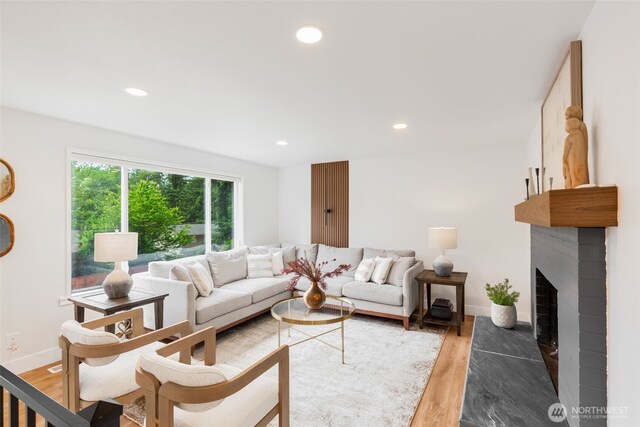 331 137th St SW, Everett, WA 98208 - living area with light wood-style floors, recessed lighting, and a brick fireplace