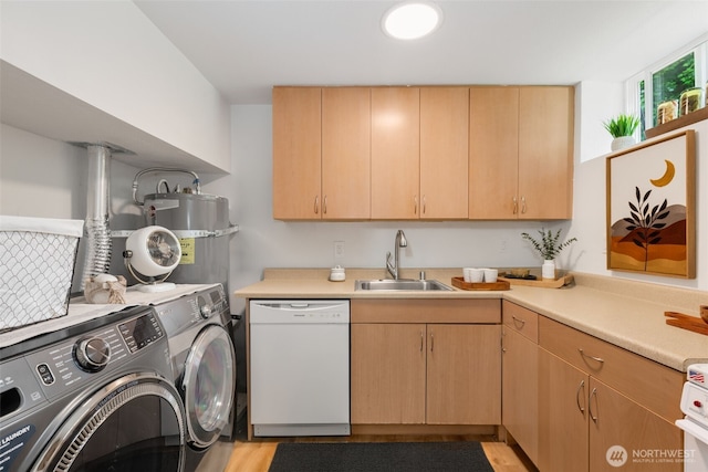 331 137th St SW, Everett, WA 98208 - washroom featuring washer and dryer, water heater, and light wood-style flooring