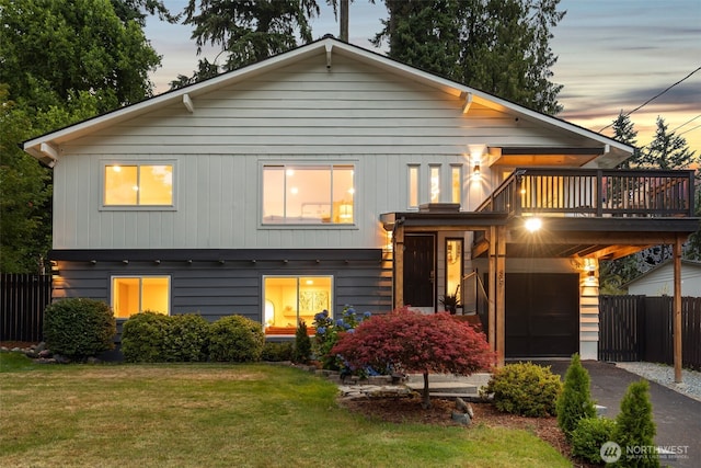 331 137th St SW, Everett, WA 98208 - view of front of house featuring driveway, a deck, and a carport