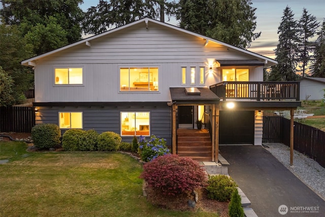 331 137th St SW, Everett, WA 98208 - view of front facade featuring asphalt driveway, an attached garage, and a carport