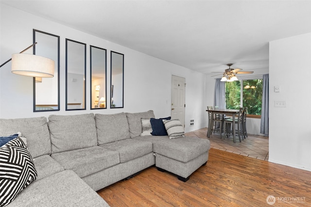 17504 Loop Ln SE, Yelm, WA 98597 - living area with ceiling fan and wood finished floors