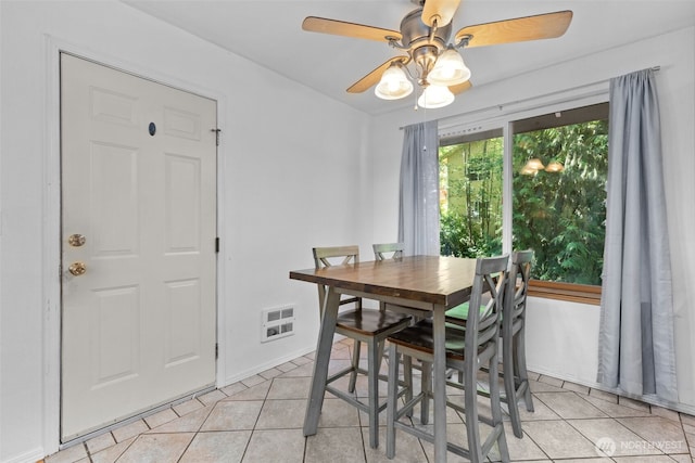 17504 Loop Ln SE, Yelm, WA 98597 - dining room with light tile patterned floors and ceiling fan
