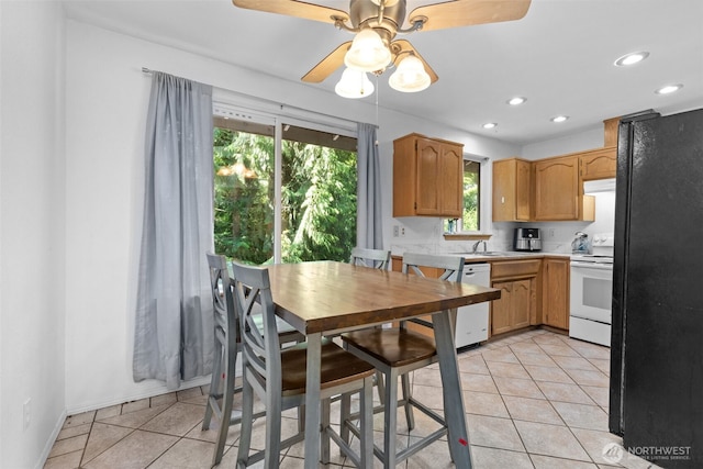 17504 Loop Ln SE, Yelm, WA 98597 - kitchen featuring white appliances, light tile patterned flooring, light countertops, ceiling fan, and recessed lighting