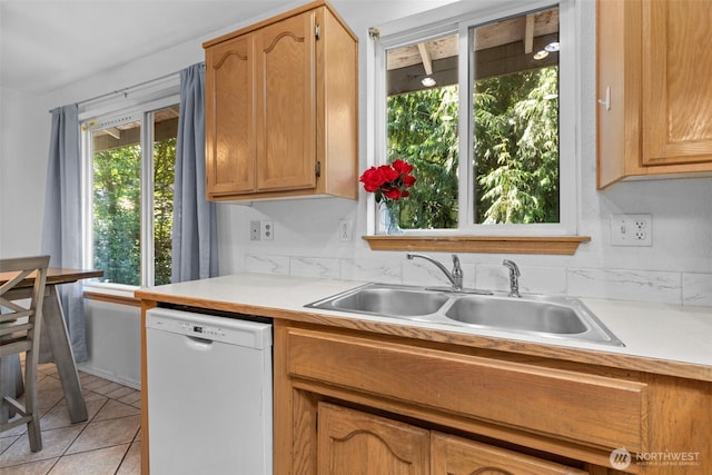 17504 Loop Ln SE, Yelm, WA 98597 - kitchen with white dishwasher, light countertops, and light tile patterned floors