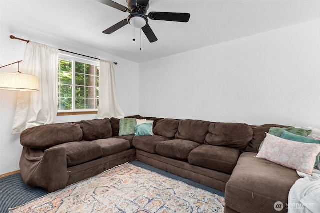 17504 Loop Ln SE, Yelm, WA 98597 - carpeted living room with a ceiling fan and baseboards