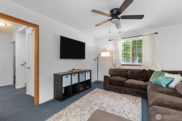17504 Loop Ln SE, Yelm, WA 98597 - living area with dark carpet and ceiling fan
