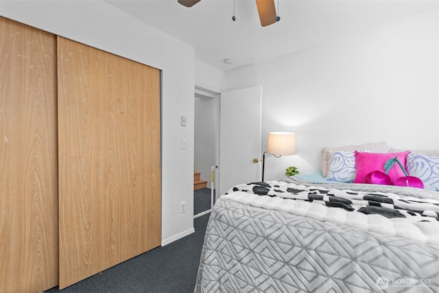 17504 Loop Ln SE, Yelm, WA 98597 - carpeted bedroom featuring ceiling fan and a closet
