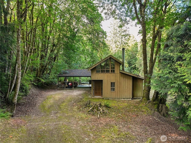 9744 Cascade Loop NE, Olympia, WA 98516 - view of outbuilding with a forest view and driveway