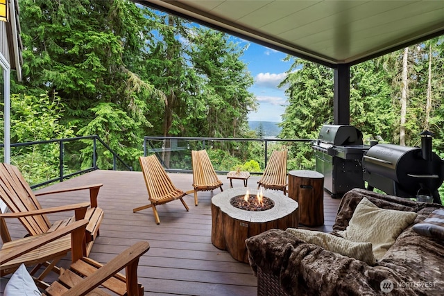 18608 SE 58th St, Issaquah, WA 98027 - deck with a fire pit and area for grilling