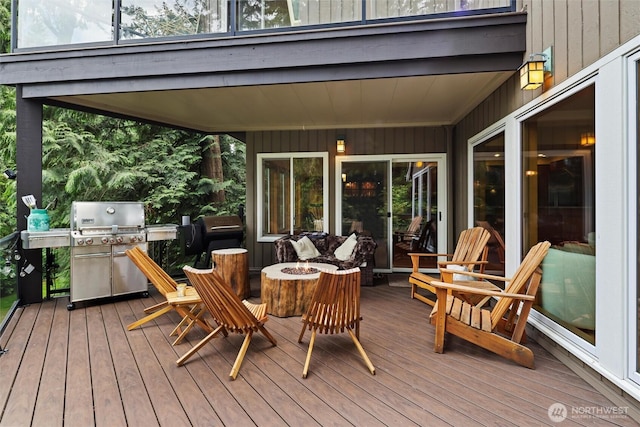 18608 SE 58th St, Issaquah, WA 98027 - wooden deck with an outdoor fire pit and area for grilling