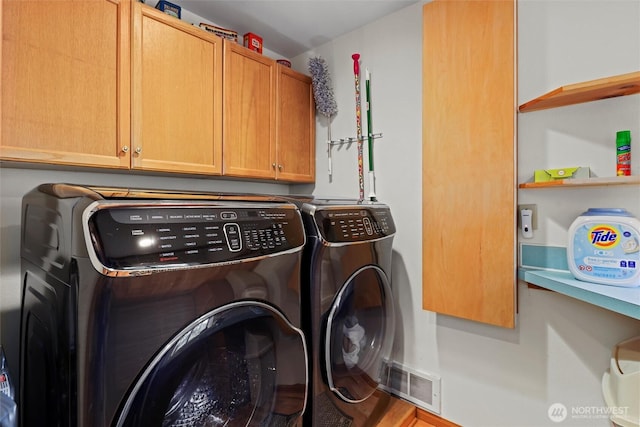 18608 SE 58th St, Issaquah, WA 98027 - washroom with cabinet space and independent washer and dryer