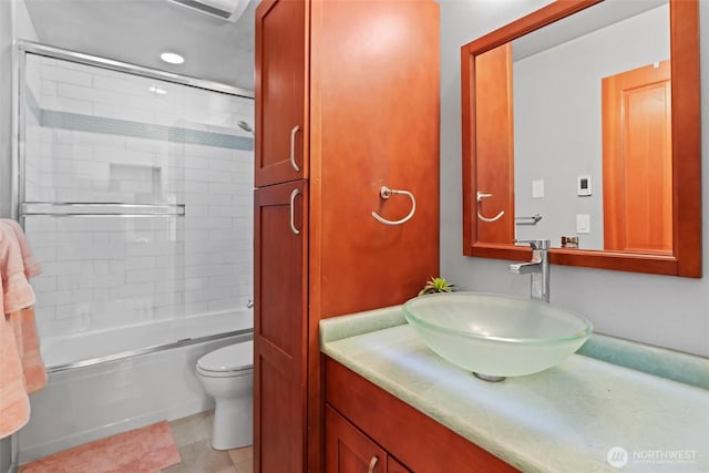 18608 SE 58th St, Issaquah, WA 98027 - bathroom with vanity, bath / shower combo with glass door, and tile patterned floors
