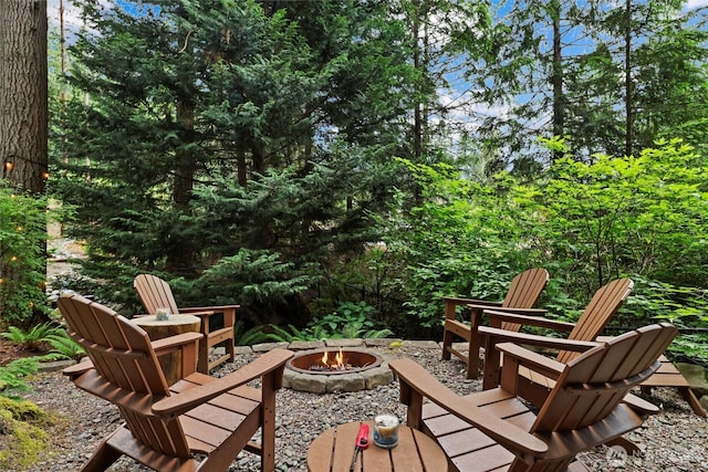 18608 SE 58th St, Issaquah, WA 98027 - view of patio / terrace featuring an outdoor fire pit