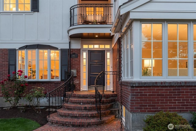 1915 35th Ave W, Seattle, WA 98199 - property entrance featuring a balcony and brick siding