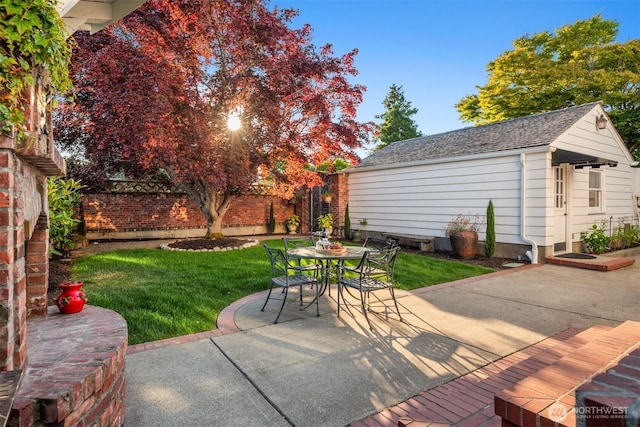 1915 35th Ave W, Seattle, WA 98199 - fenced backyard with a patio and outdoor dining area