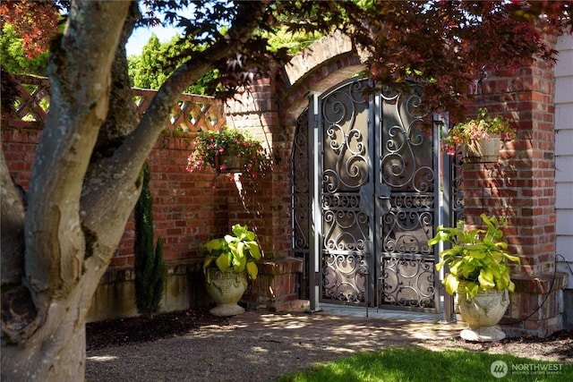 1915 35th Ave W, Seattle, WA 98199 - property entrance featuring a gate and brick siding