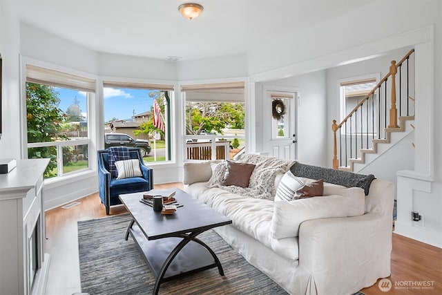 807 24th St, Anacortes, WA 98221 - living room featuring wood finished floors and stairway