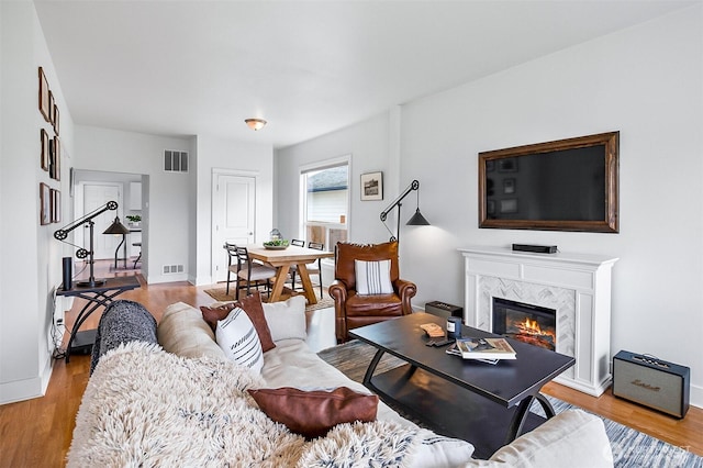 807 24th St, Anacortes, WA 98221 - living area featuring wood finished floors and a tile fireplace