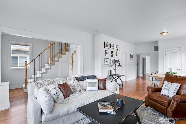 807 24th St, Anacortes, WA 98221 - living room featuring stairway and wood finished floors