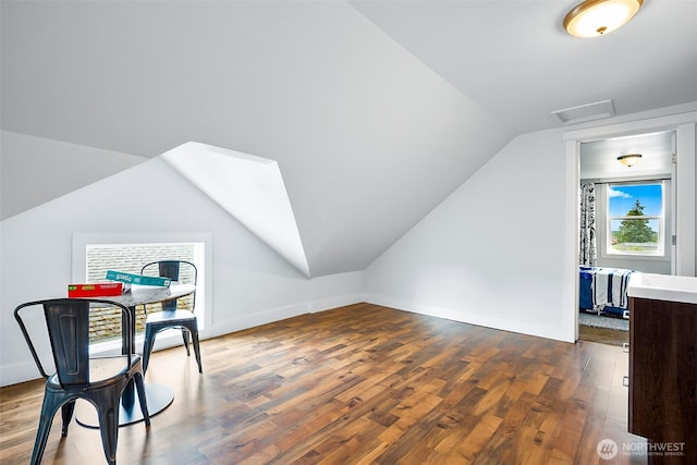 807 24th St, Anacortes, WA 98221 - bonus room featuring lofted ceiling, wood finished floors, and attic access