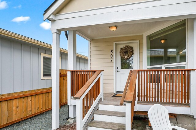 807 24th St, Anacortes, WA 98221 - doorway to property featuring a porch and board and batten siding