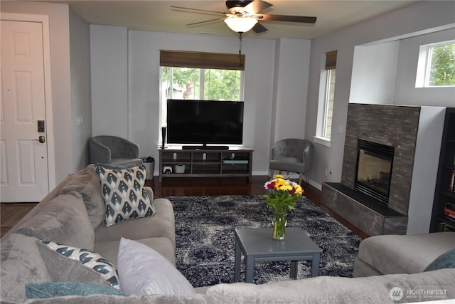 4201 Mckinley St NE, Lacey, WA 98516 - living room with a ceiling fan, wood finished floors, and a fireplace