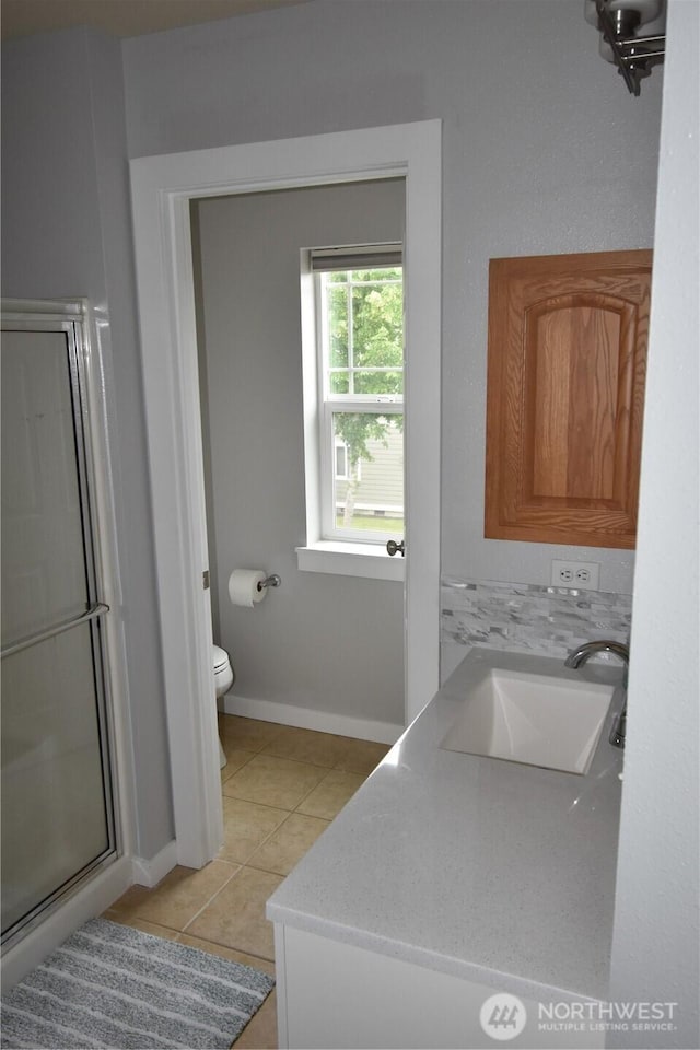 4201 Mckinley St NE, Lacey, WA 98516 - bathroom with a shower stall, vanity, and tile patterned floors