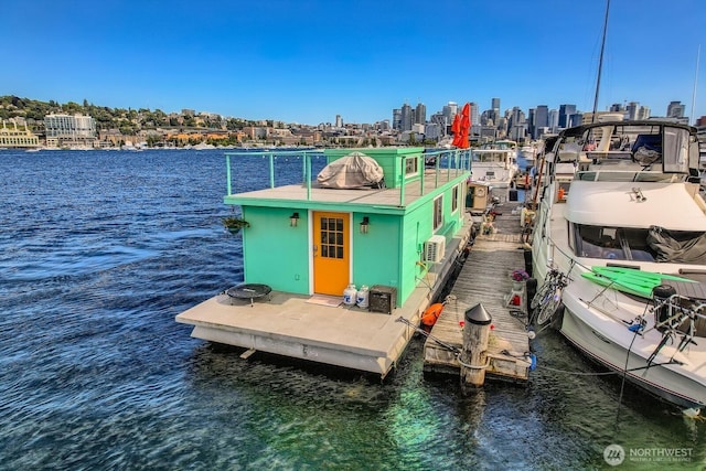 1818 Westlake Ave N Unit D-33, Seattle, WA 98109 - dock featuring a skyline view and a water view