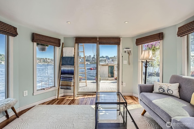 1818 Westlake Ave N Unit D-33, Seattle, WA 98109 - living room with light wood finished floors, recessed lighting, and a view of city