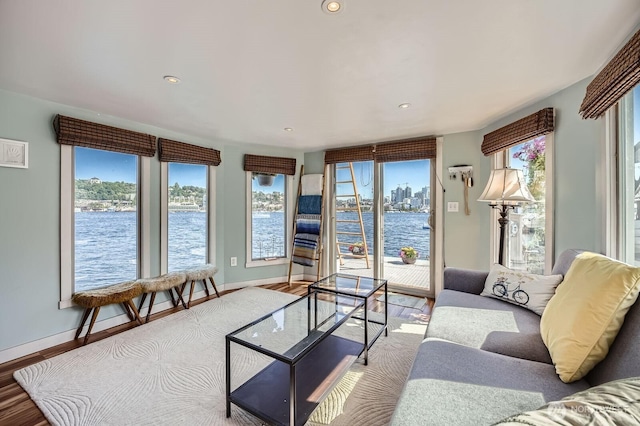 1818 Westlake Ave N Unit D-33, Seattle, WA 98109 - living room with a water view, wood finished floors, and recessed lighting