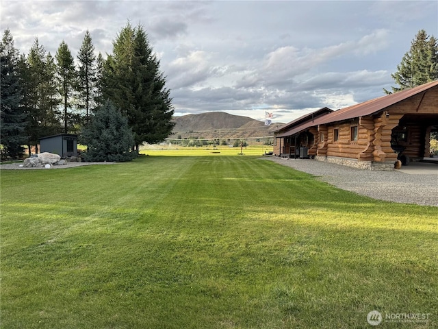 8 Iris Ln, Twisp, WA 98856 - view of grassy yard featuring a mountain view