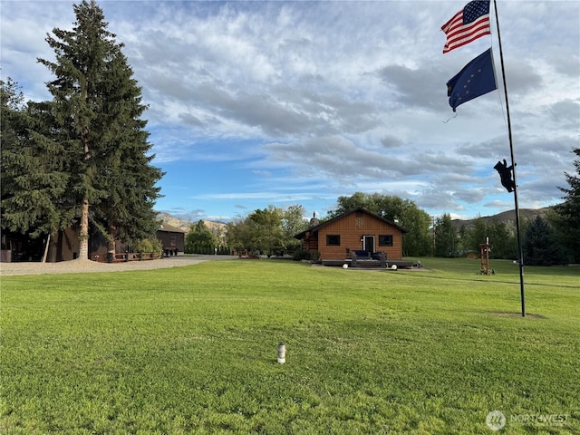8 Iris Ln, Twisp, WA 98856 - view of green lawn with a mountain view