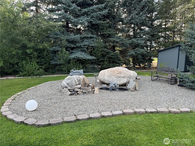 8 Iris Ln, Twisp, WA 98856 - view of patio featuring an outdoor fire pit