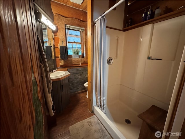 8 Iris Ln, Twisp, WA 98856 - full bath with wood finished floors, a stall shower, and vanity