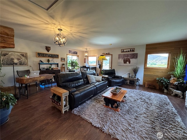 8 Iris Ln, Twisp, WA 98856 - living room featuring wood finished floors, a chandelier, and a desk