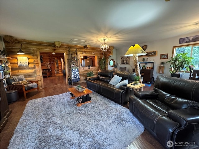 8 Iris Ln, Twisp, WA 98856 - living area with log walls, wood finished floors, and attic access