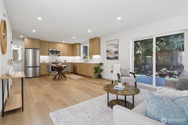 11737 38th Ave NE Unit B, Seattle, WA 98125 - living area featuring light wood-style floors and recessed lighting