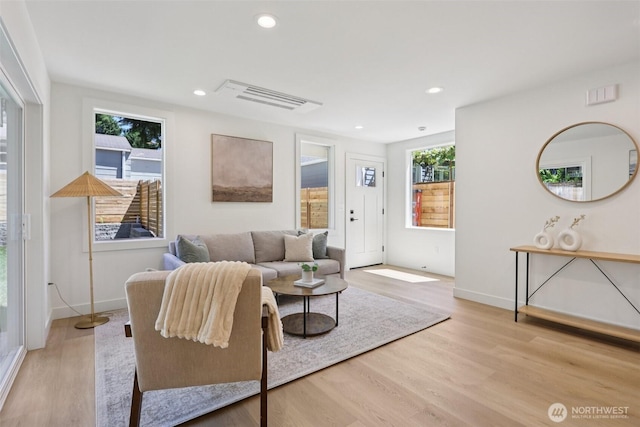 11737 38th Ave NE Unit B, Seattle, WA 98125 - living room featuring light wood-type flooring and recessed lighting