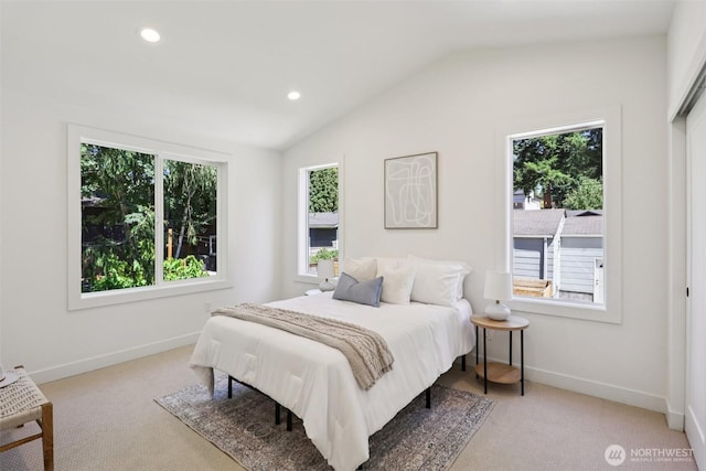 11737 38th Ave NE Unit B, Seattle, WA 98125 - bedroom with lofted ceiling, carpet flooring, and recessed lighting