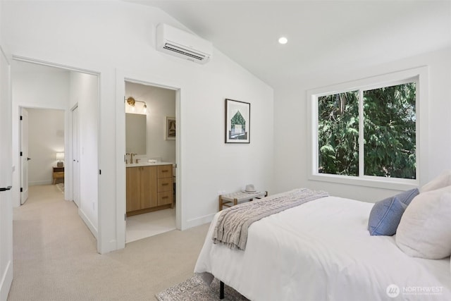 11737 38th Ave NE Unit B, Seattle, WA 98125 - bedroom with a wall mounted air conditioner, vaulted ceiling, light carpet, recessed lighting, and ensuite bathroom