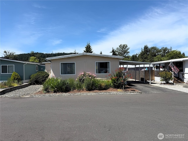 1200 Lincoln St Unit 418, Bellingham, WA 98229 - manufactured / mobile home with a carport and driveway
