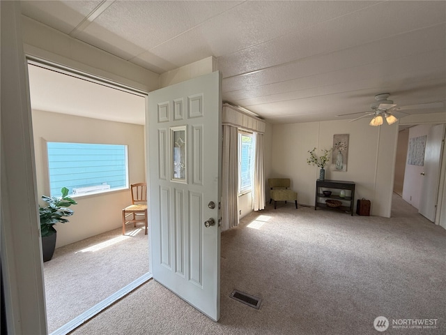 1200 Lincoln St Unit 418, Bellingham, WA 98229 - foyer featuring carpet and ceiling fan